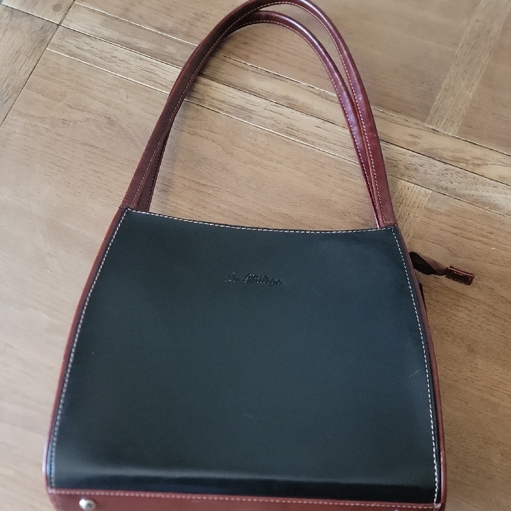 Black and Brown Crescent Shoulder Bag with Structured Design